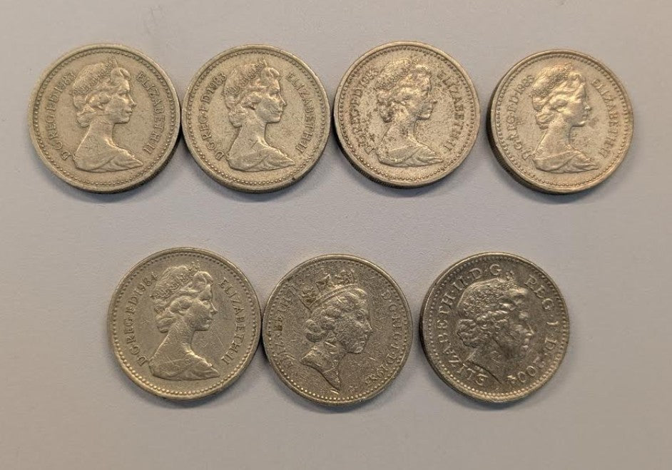 NL*REGNO UNITO Lotto 7 pezzi 1 POUND / STERLINA 1983-1984-1985-2004 come da foto